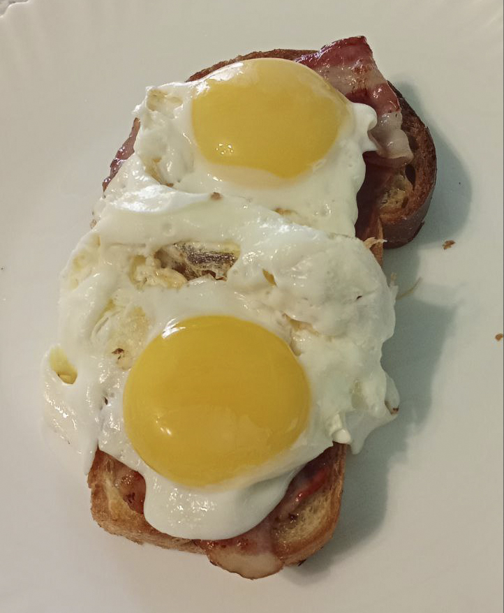 Enjoying a hearty breakfast.