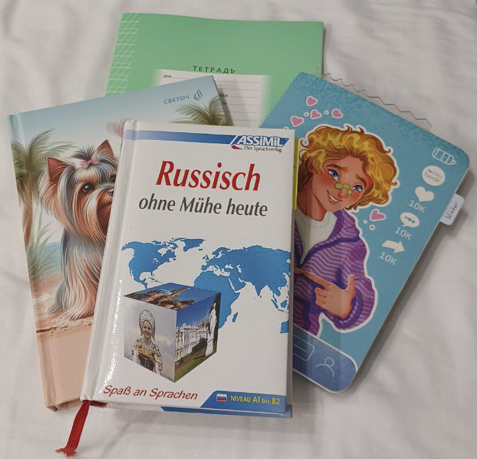 In English the textbook is called "Russian with Ease" but the German title transfers to "Russian without effort" or "Russian without trouble" - that is so not true.
